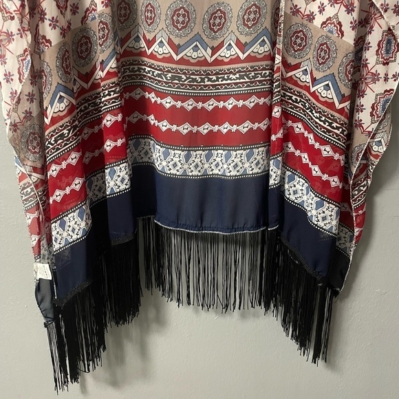 Kimono open style with stitched arm holes and short sleeves. One size - Picture 3 of 7